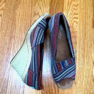 Tom’s peep toe cork heel wedges.